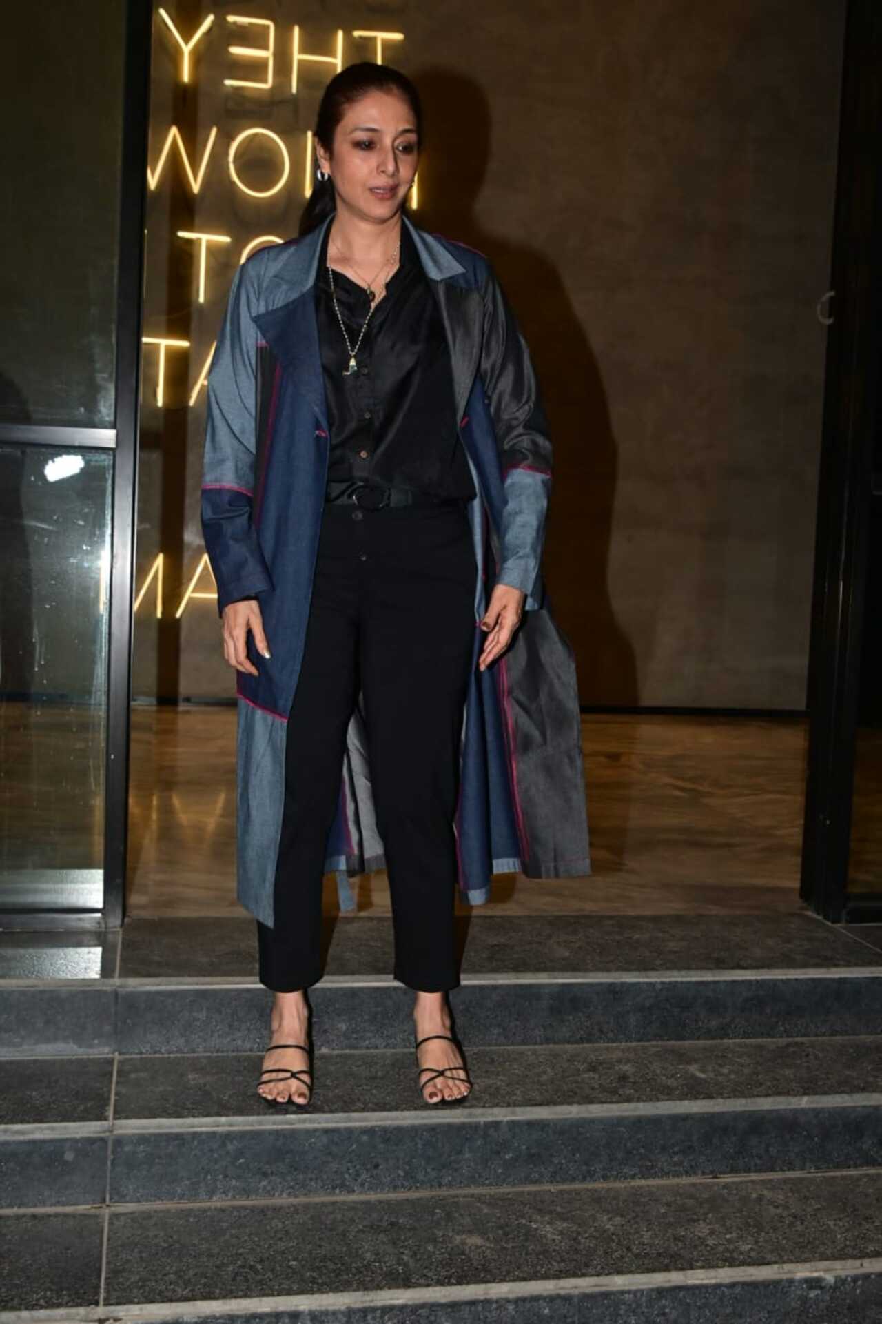 <p>Tabu was spotted at a screening looking effortlessly chic. She paired a black shirt with tailored black trousers, layering it with a long, structured jacket.</p>